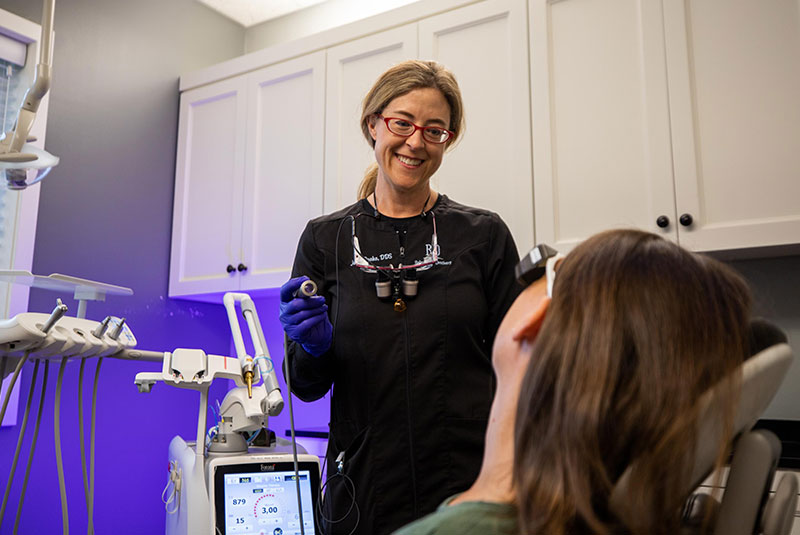 Dr. ruoho with dental patient